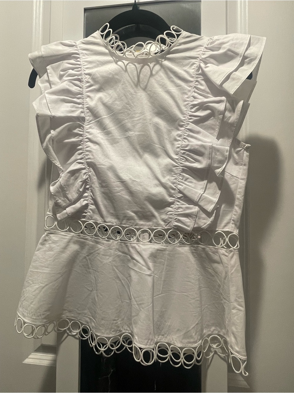 White Ruffle Peplum Top with Circular Trim